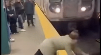 فيديو مُولّد بالذكاء الاصطناعي لسيدة تدفع شاب نحو سكة القطار