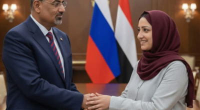 صورة عيدروس الزبيدي مع حنان المخلافي في موسكو مُولّدة بالذكاء الاصطناعي